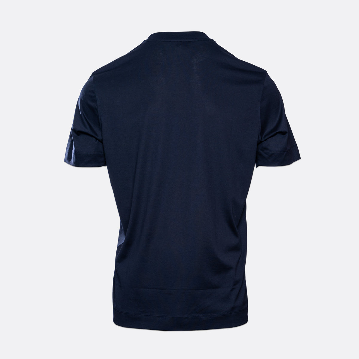 A dark navy blue short-sleeve athletic t-shirt shown from the back, displayed on a clean, light gray background. Emporio Armani T-Shirt. Sakks Menswear Southampton.