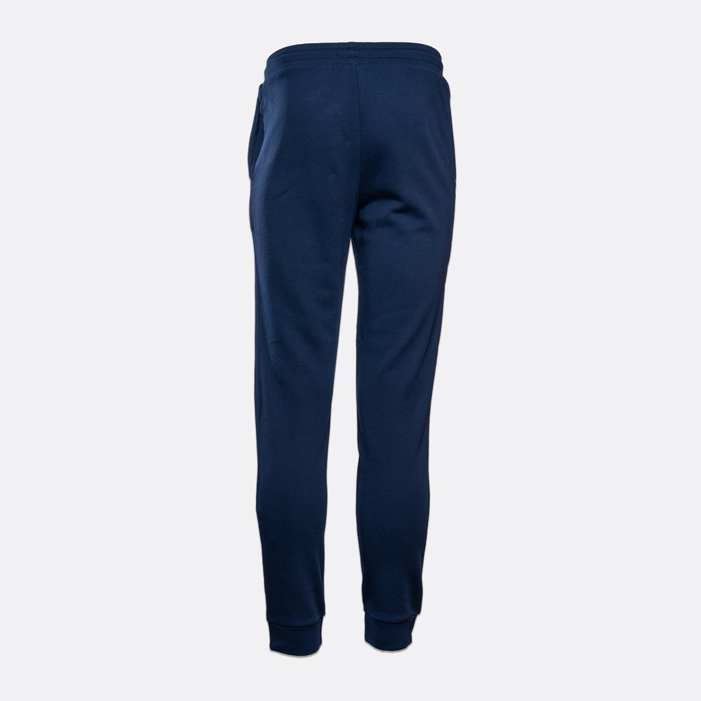 A pair of navy blue sweatpants shown from the back, featuring an elastic waistband and ribbed ankle cuffs, set against a plain light gray background. Emporio Armani Sweat Pants. Sakks Menswear Southampton.