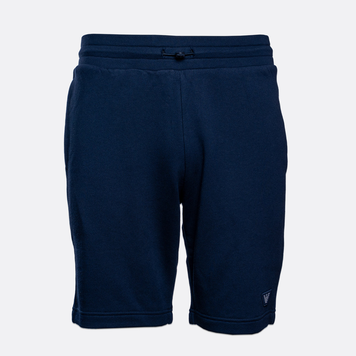 A pair of navy blue sweat shorts with an elastic waistband and drawstring, shown against a light gray background. Emporio Armani Shorts. Sakks Menswear Southampton.