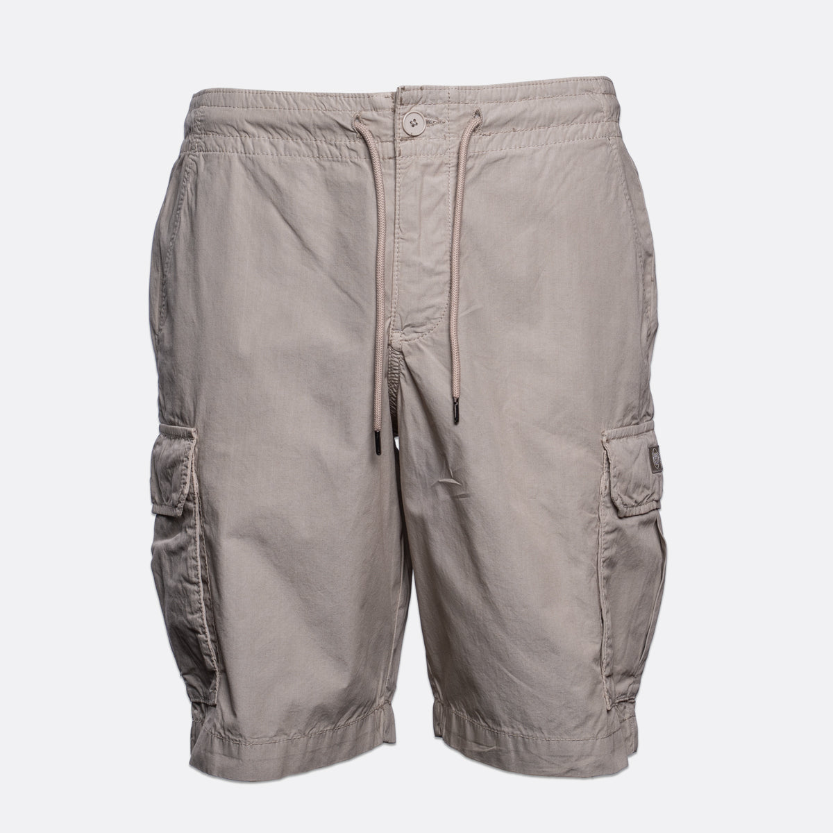 A pair of light taupe cargo shorts with a drawstring waist, shown against a plain light gray background. Emporio Armani Shorts. Sakks Menswear Southampton.