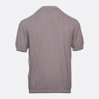 A short-sleeve knit polo shirt shown from the back, featuring a textured chevron pattern in a muted taupe-gray color, set against a plain light gray background. Emporio Armani T-Shirt. Sakks Menswear Southampton.