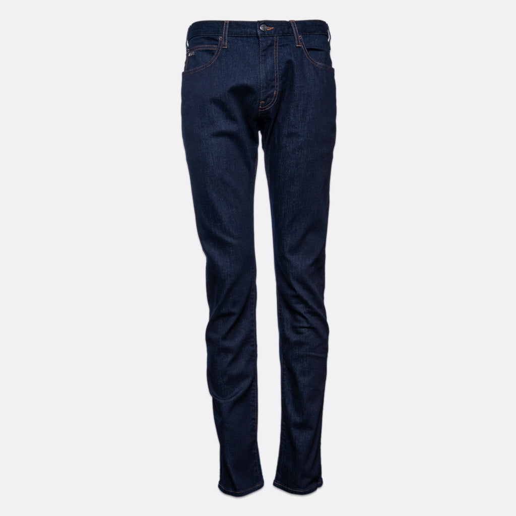 A pair of dark blue slim-fit jeans shown from the back on a light gray background. Emporio Armani Jeans. Sakks Menswear Southampton.