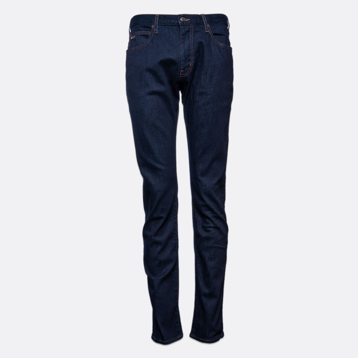 A pair of dark blue slim-fit jeans shown from the back on a light gray background. Emporio Armani Jeans. Sakks Menswear Southampton.