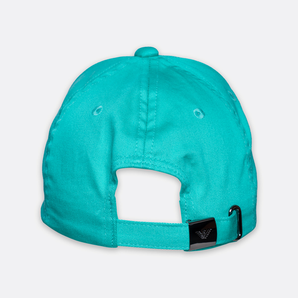 Turquoise baseball cap shown from the back, featuring a fabric strap with a black plastic toggle and a small black square patch with a stylised logo. Emporio Armani Cap. Sakks Menswear Southampton.