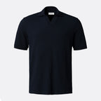 A dark navy blue short-sleeve polo shirt with a classic collar, displayed on a clean, light grey background. Eton Polo available at Sakks Menswear in Southampton.