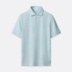 A light blue short-sleeve polo shirt with a three-button placket, displayed on a clean, light gray background. Eton Polo. Sakks Menswear Southampton.