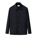 A dark navy blue long-sleeve button-up jacket with a pointed collar and side pockets, shown against a plain white background. Eton Shirt Jacket. Sakks Menswear Southampton.