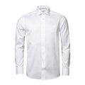 A white long-sleeve dress shirt with a classic collar and button-down front, shown on a clean white background. Eton Shirt. Sakks Menswear Southampton.