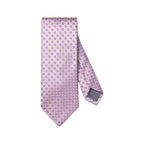 A lavender and purple patterned silk necktie with a repeating geometric design, displayed flat against a solid white background. Eton Ties available at Sakks Menswear in Southampton.