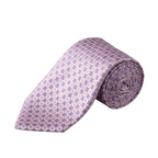 A rolled necktie with a repeating geometric pattern in lavender purple and light pink, displayed on a clean white background. Eton Ties available at Sakks Menswear in Southampton.