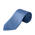 A blue patterned necktie with a textured, woven geometric design, shown partially rolled on a plain white background. Eton Ties available at Sakks Menswear in Southampton.