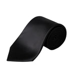 A classic black necktie with a satin-like finish, shown partially unrolled from its roll against a solid white background. Eton Ties available at Sakks Menswear in Southampton.