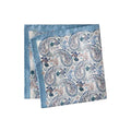A folded square silk pocket square featuring a blue and beige paisley pattern with a solid light blue border, displayed on a clean white background. Eton Pocket Square available at Sakks Menswear in Southampton.