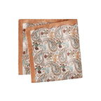 A folded square silk pocket square featuring a detailed paisley pattern in muted tones of brown, beige, and teal on a cream background, with a solid tan border. The brand name 'ETON' is partially visible in the pattern. Eton Pocket Square available at Sakks Menswear in Southampton.