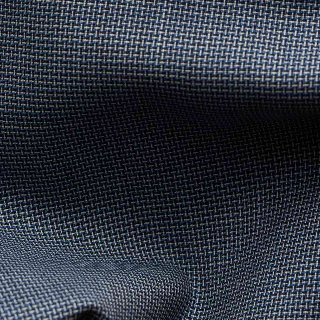 Close-up of a woven fabric texture in dark navy blue with lighter blue and gray threads forming a subtle basketweave pattern. Eton Shirt available at Sakks Menswear in Southampton.