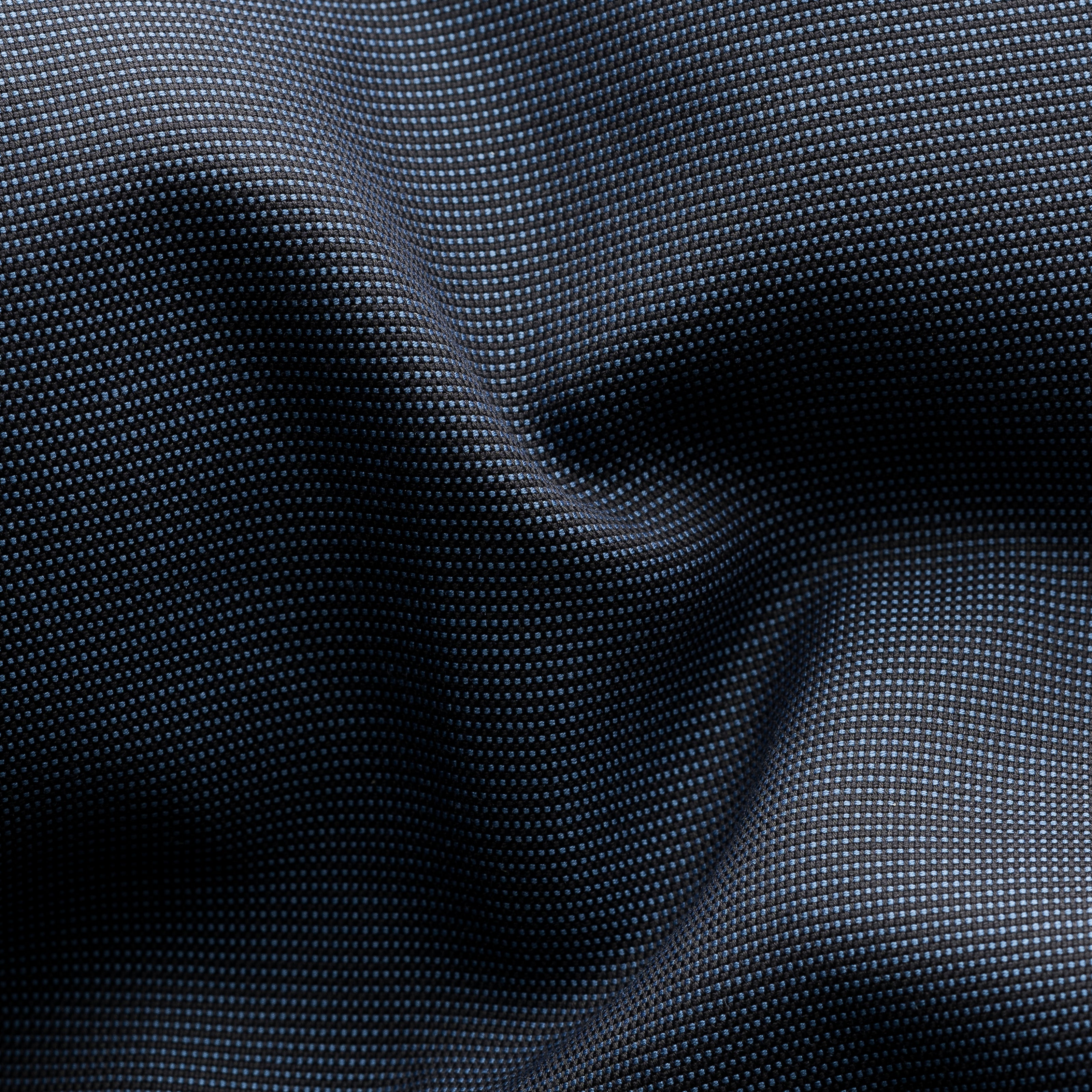 A close-up of dark charcoal gray fabric with a fine woven texture and soft folds. Eton Shirt available at Sakks Menswear in Southampton.