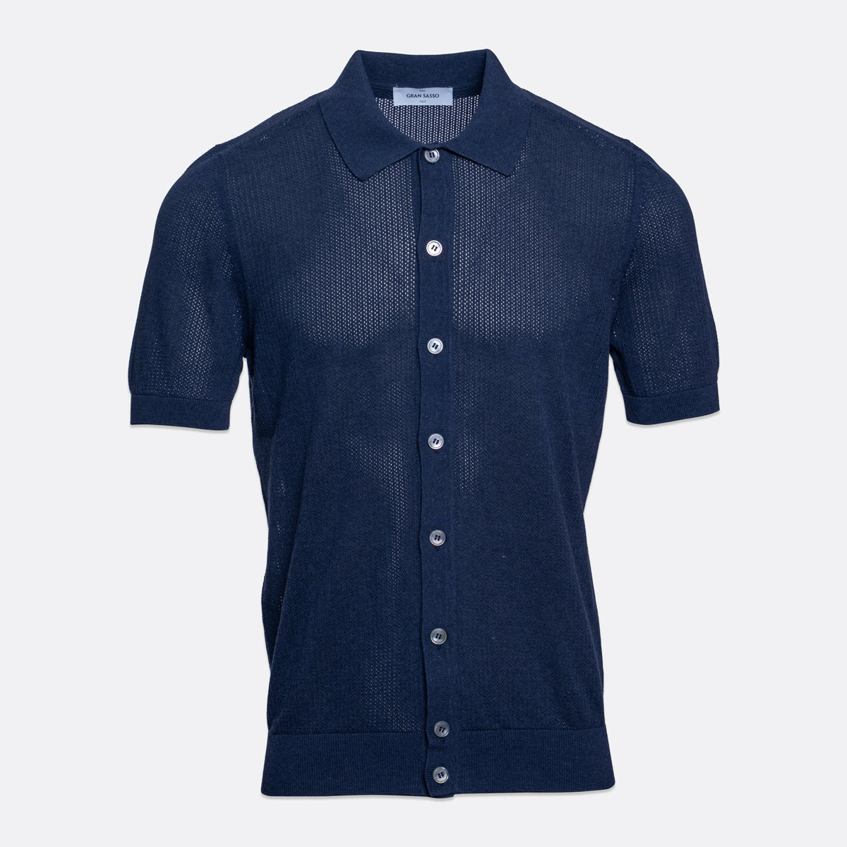 A navy blue short-sleeve knit polo shirt with a button-down front, displayed on a clean light grey background. Gran Sasso Polo available at Sakks Menswear in Southampton.
