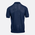 A navy blue short-sleeve knit polo shirt shown from the back, featuring a textured open-knit pattern and ribbed collar, cuffs, and hem, set against a plain light gray background. Gran Sasso Polo available at Sakks Menswear in Southampton.