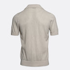 A light beige textured short-sleeve knit polo shirt shown from the back, displayed on a clean light grey background. Gran Sasso Polo available at Sakks Menswear in Southampton.