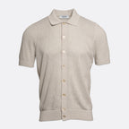 A light beige short-sleeve knit polo shirt with a textured waffle weave, button-down front, and a classic collar, shown on a light grey background. Gran Sasso Polo available at Sakks Menswear in Southampton.