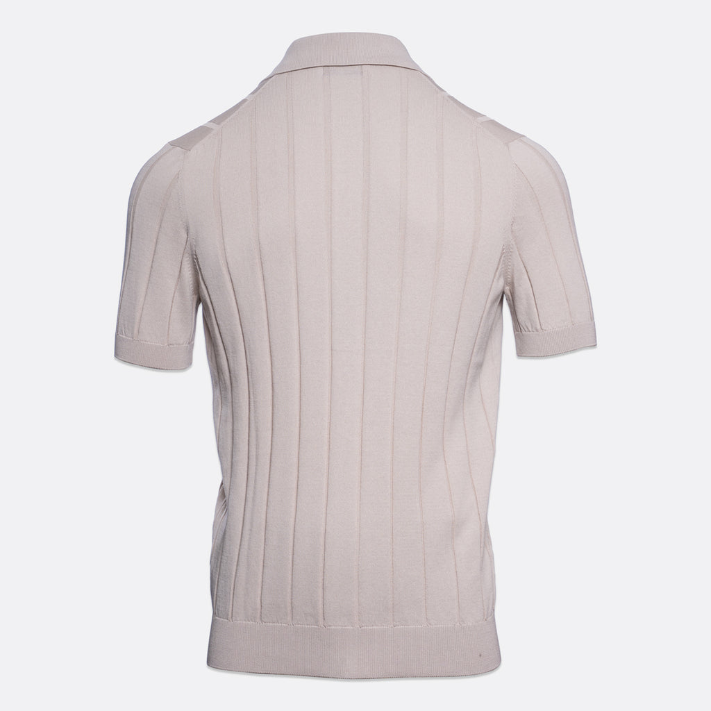 A short-sleeve knit polo shirt shown from the back, featuring vertical ribbed texture and a classic collar, in a light taupe-beige colour on a plain light grey background. Gran Sasso Polo available at Sakks Menswear in Southampton.