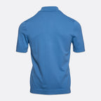 A blue short-sleeve polo shirt shown from the back, displayed on a clean, light gey background. Gran Sasso Polo available at Sakks Menswear in Southampton.