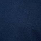 A close-up of dark navy blue knit fabric texture. Gran Sasso T-Shirt available at Sakks Menswear in Southampton.