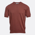A short-sleeve crewneck knit sweater in a muted terracotta or rust colour, displayed on a clean, light grey background. Gran Sasso T-Shirt available at Sakks Menswear in Southampton.