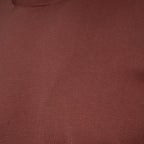 Close-up of a ribbed knit fabric in a muted dusty rose or mauve colour. Gran Sasso T-Shirt available at Sakks Menswear in Southampton.