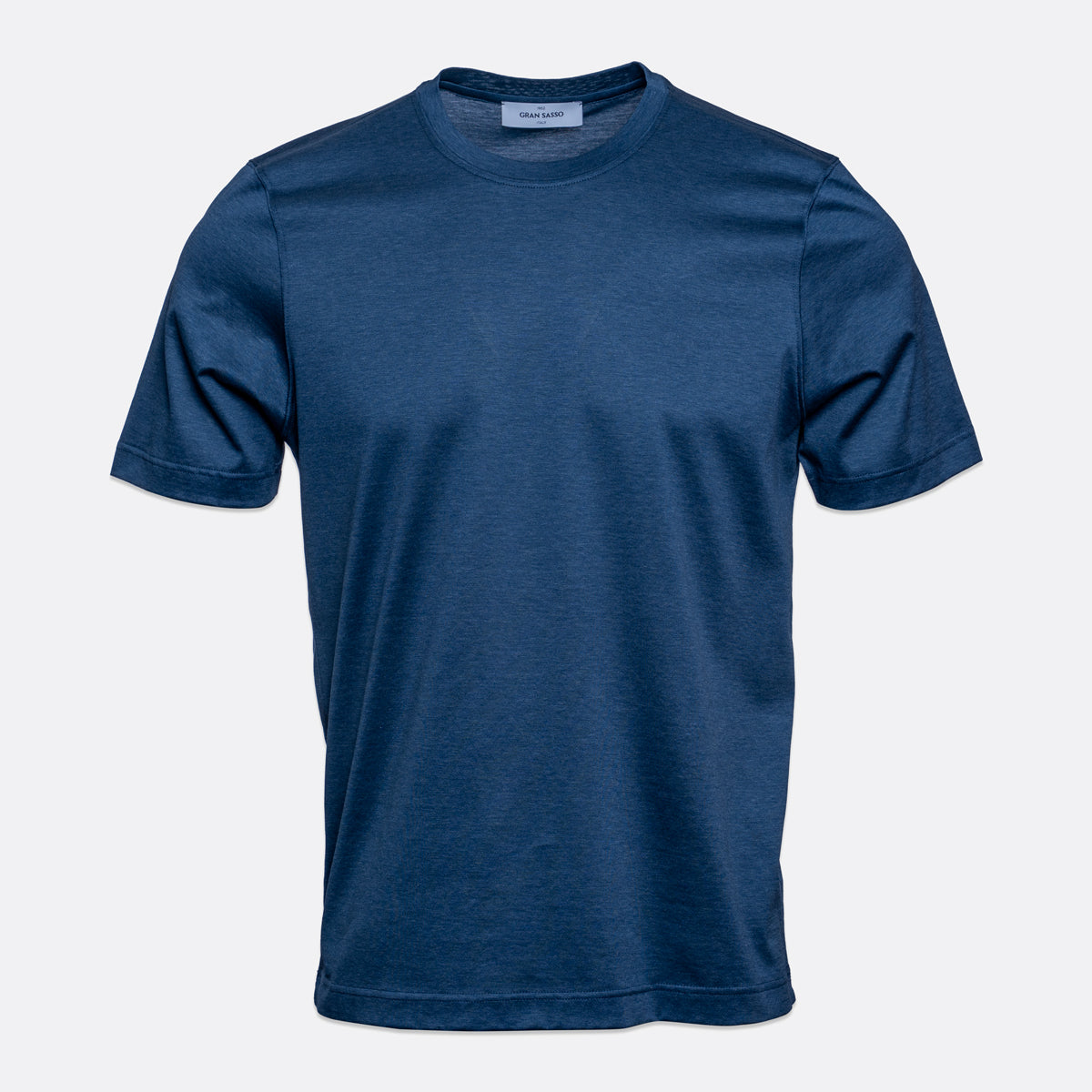 A classic short-sleeve crewneck t-shirt in a solid dark blue colour, displayed on a clean, light grey background. Gran Sasso T-Shirt available at Sakks Menswear in Southampton.