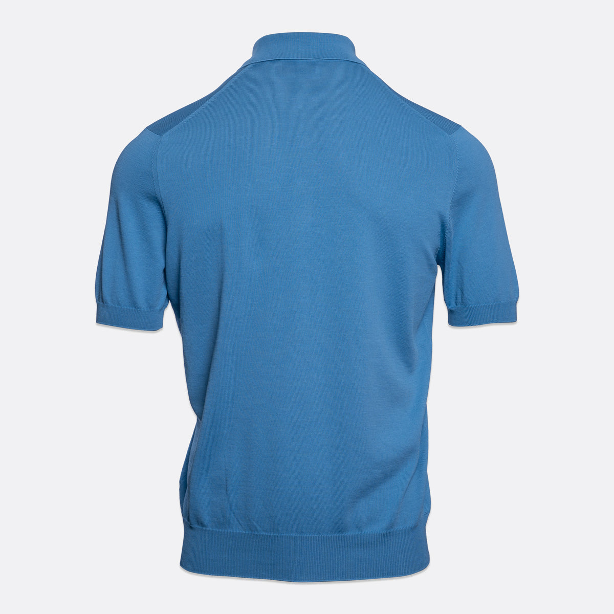 A blue short-sleeve polo shirt shown from the back, displayed on a light grey background. Gran Sasso Polo available at Sakks Menswear in Southampton.