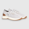 Light grey sneakers with white soles and brown soles on a light grey background. Gran Sasso Sneakers available at Sakks Menswear in Southampton.