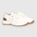A pair of white knit athletic sneakers with brown accents on the heel, toe bumper, and sole, shown against a light grey background. Gran Sasso Sneakers available at Sakks Menswear in Southampton.