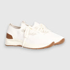 A pair of white knit athletic sneakers with brown accents on the heel, toe bumper, and sole, shown against a light grey background. Gran Sasso Sneakers available at Sakks Menswear in Southampton.