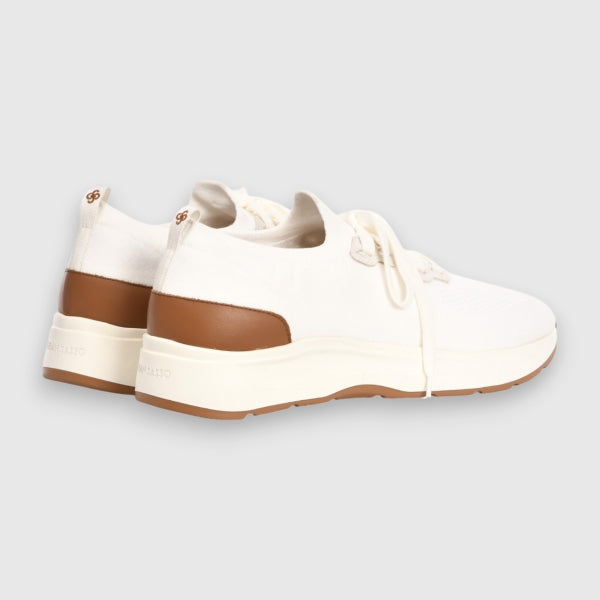 White sneakers with brown accents on a light grey background. Gran Sasso Sneakers available at Sakks Menswear in Southampton.