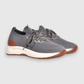 Grey sneakers with brown accents on a light grey background. Gran Sasso Sneakers available at Sakks Menswear in Southampton.
