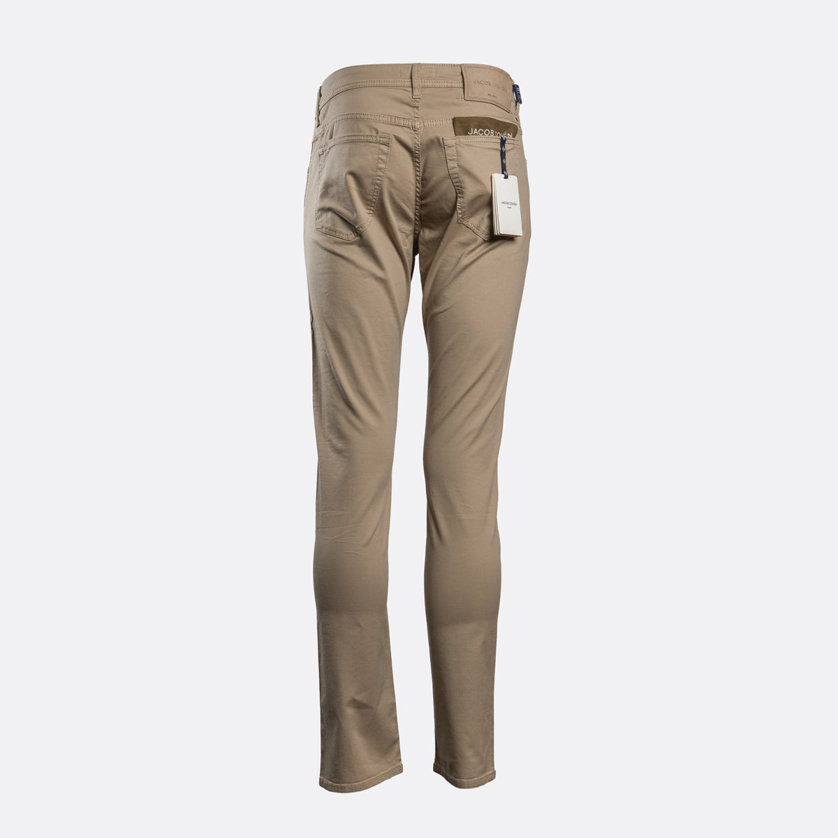 Beige chinos on white background. Jacob Cohën Chinos available at Sakks Menswear in Southampton.