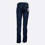Back view of dark blue denim jeans with a gray waistband and a white hangtag, shown against a light gray background. Jacob Cohën Jeans available at Sakks Menswear in Southampton.