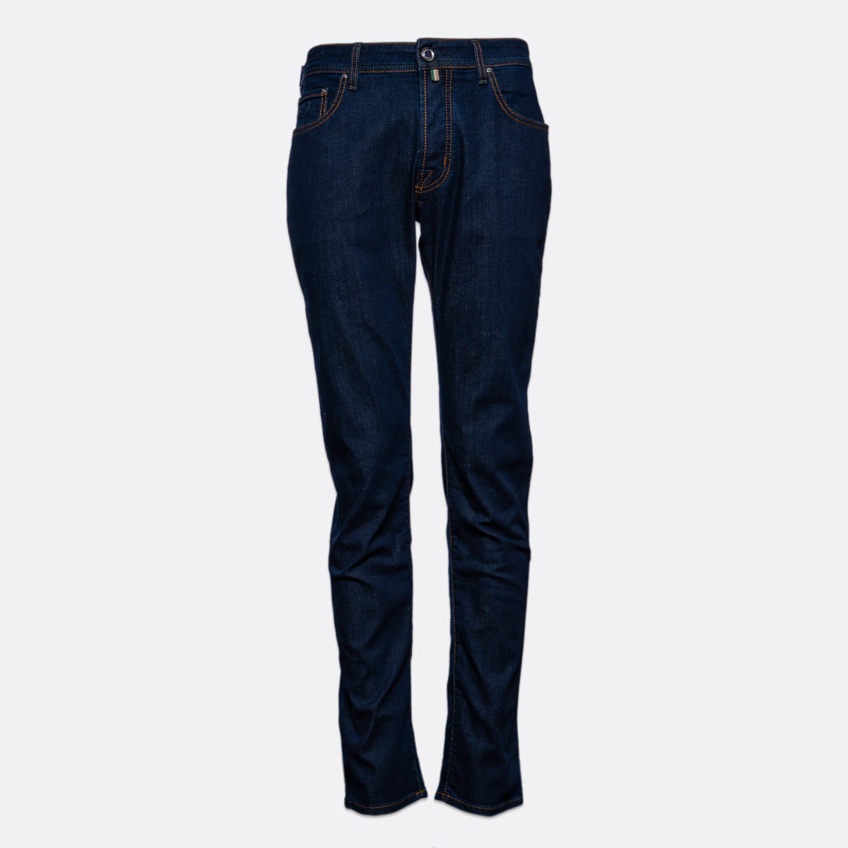 A pair of dark blue slim-fit jeans shown flat against a light gray background. Jacob Cohën Jeans available at Sakks Menswear in Southampton.