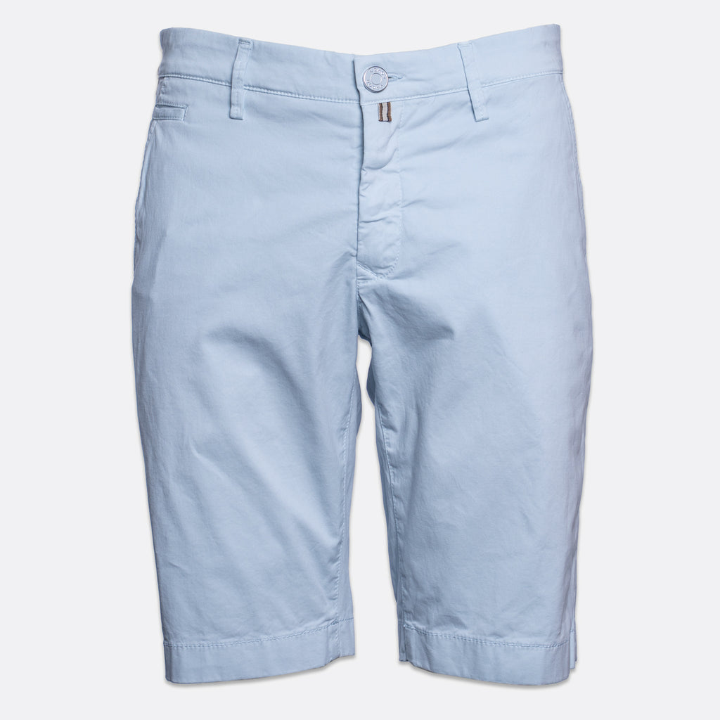 Light blue chino shorts with a button closure and belt loops, shown flat against a light gray background. Jacob Cohën Shorts available at Sakks Menswear in Southampton.