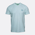 A light blue crewneck t-shirt with a small blue geometric logo on the left chest, displayed on a neutral light gray background. MA.Strum T-Shirt available at Sakks Menswear in Southampton.