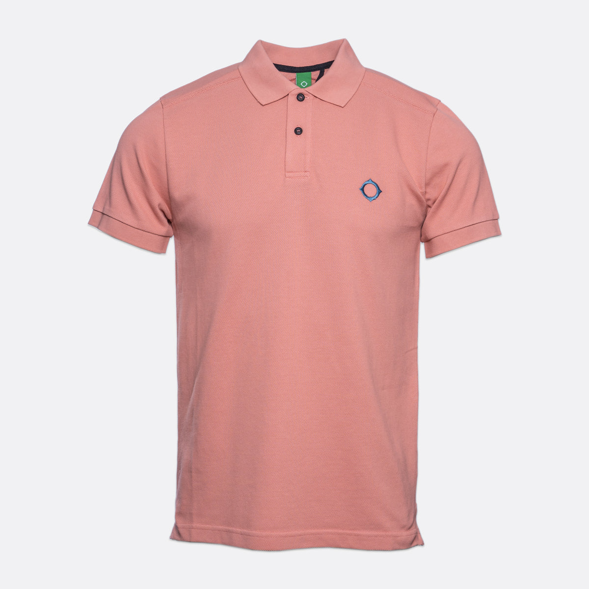 Clay coloured short sleeve polo shirt with contrast grey buttons. Light green branded tag on the inside of the collar and embroidered silver blue MA.Strum compass logo on left side of chest. MA.Strum Polo available at Sakks Menswear in Southampton.