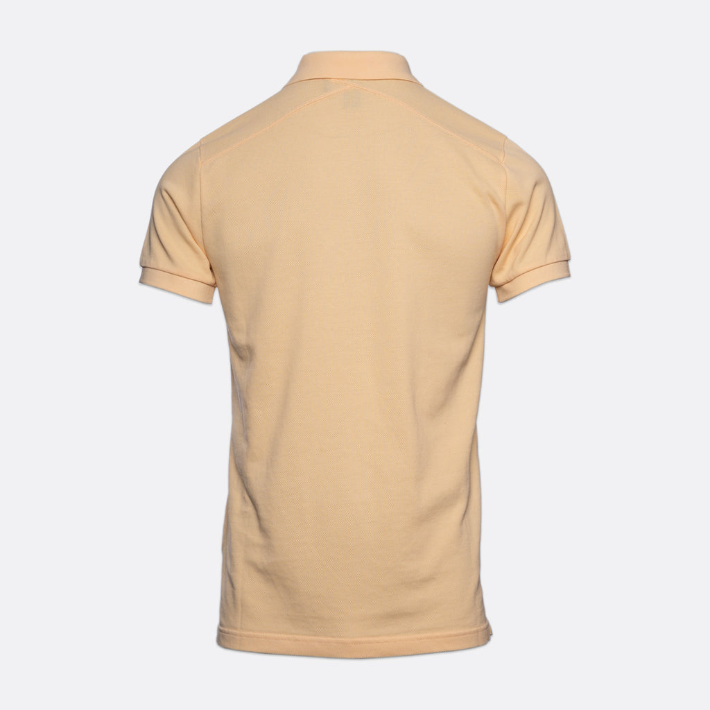 A light beige short-sleeve polo shirt shown from the back, displayed on a clean, light gray background. MA.Strum Polo available at Sakks Menswear in Southampton.
