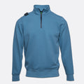A blue long-sleeve quarter-zip sweatshirt with a mock neck, ribbed cuffs and hem, and a small black shoulder tab, shown on a light gray background. MA.Strum Sweatshirt available at Sakks Menswear in Southampton.
