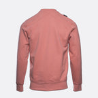 A dusty rose pink long-sleeve crewneck sweatshirt shown from the back, featuring a subtle diagonal seam across the upper back and ribbed cuffs and hem, set against a plain light gray background. MA.Strum Sweatshirt available at Sakks Menswear in Southampton.