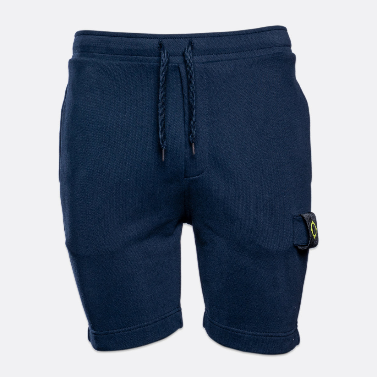 A pair of navy blue sweat shorts with a drawstring waist and a small Stone Island compass logo patch on the lower left leg, shown against a light gray background. MA.Strum Sweat Shorts available at Sakks Menswear in Southampton.
