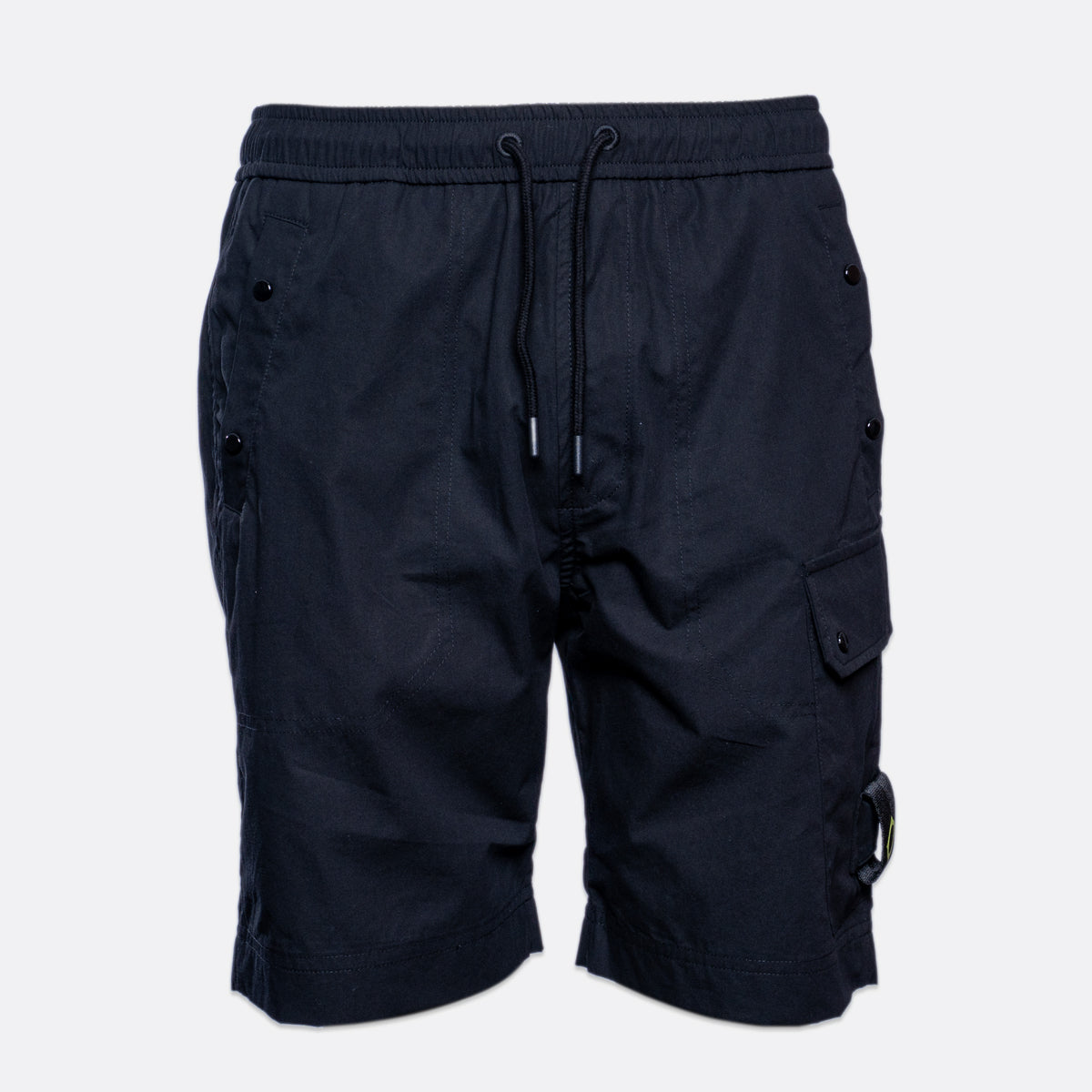 A pair of black cargo shorts with an elastic waistband, black drawstring, and multiple utility pockets, shown against a light gray background. MA.Strum Shorts available at Sakks Menswear in Southampton.