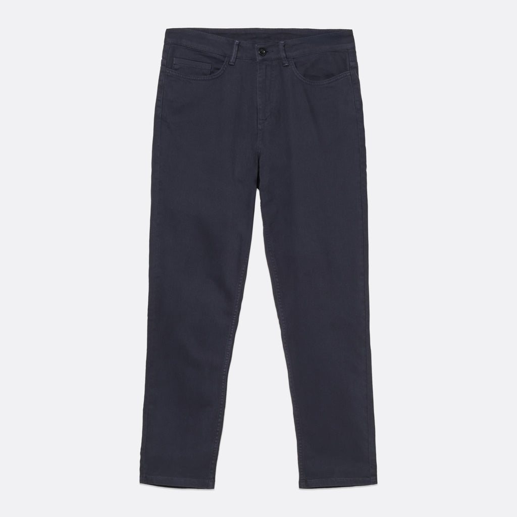A pair of slim-fit dark navy blue jeans shown flat against a light gray background. MA.Strum Jeans available at Sakks Menswear in Southampton.