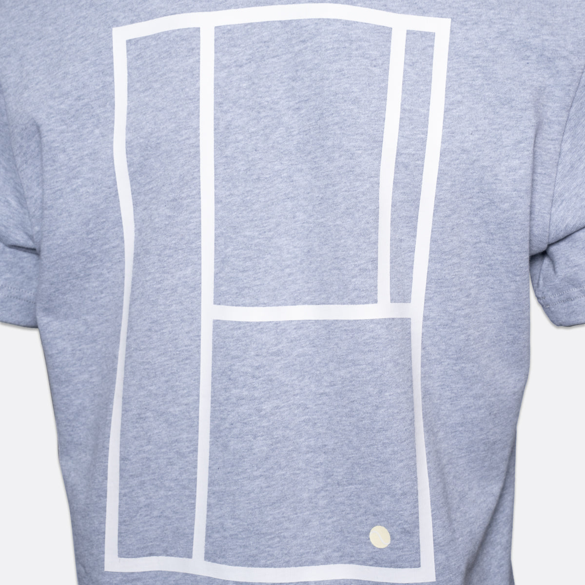 Close-up of a heather light blue-gray T-shirt with a large white tennis court line graphic on the front and a small white circular detail near the lower  right. PAIGE T-Shirt available at Sakks Menswear in Southampton.