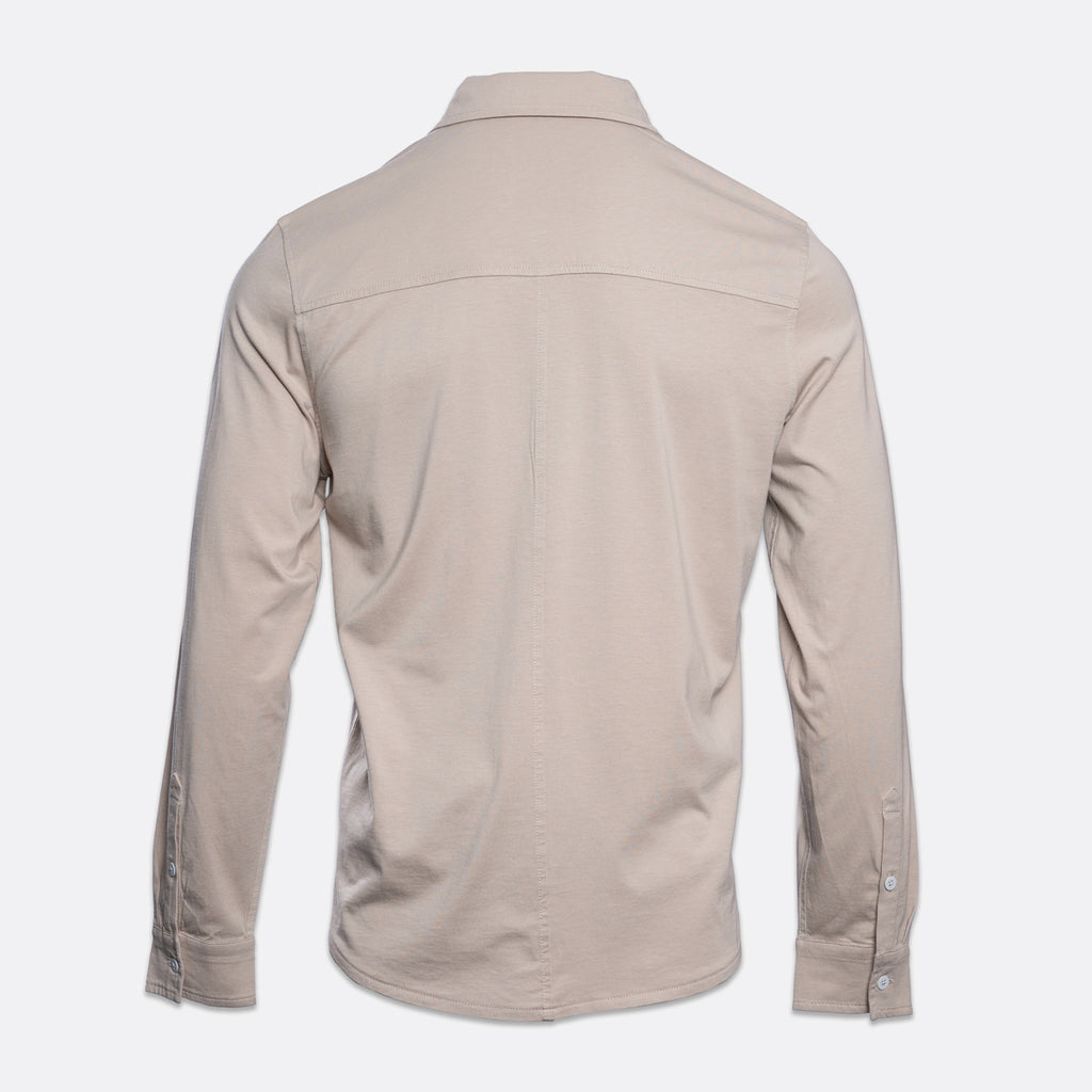 A light beige long-sleeve button-up shirt shown from the back, displayed on a clean, light gray background. PAIGE Shirt available at Sakks Menswear in Southampton.